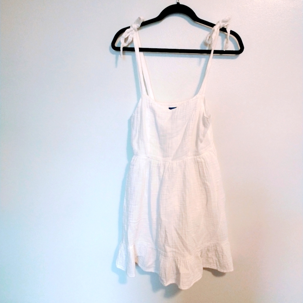 Old Navy peasant babydoll dress with adjustable tie straps. Size small smocked b
